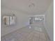 Bright room with tiled floor, paneled walls and windows providing natural light at 4509 10Th N Ave, St Petersburg, FL 33713
