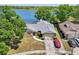 Aerial view of single-Gathering home with lush landscaping and a long driveway at 505 Timber Pond Dr, Brandon, FL 33510