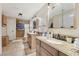Spacious bathroom with dual vanities, granite countertops, tile floors and a walk-in shower at 505 Timber Pond Dr, Brandon, FL 33510