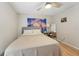 Bedroom featuring a comfortable queen bed with a Rapunzel theme and light at 505 Timber Pond Dr, Brandon, FL 33510