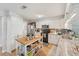 Well-equipped kitchen with stainless steel appliances, ample counter space, and stylish white cabinetry at 505 Timber Pond Dr, Brandon, FL 33510