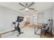 Bright office space with a desk, chair and exercise bike in the corner of the living space at 505 Timber Pond Dr, Brandon, FL 33510