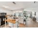 Open-concept living space with a seamless flow between the kitchen and living room, perfect for entertaining at 505 Timber Pond Dr, Brandon, FL 33510