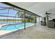 Inviting screened pool with lake view, perfect for outdoor entertainment and relaxation at 505 Timber Pond Dr, Brandon, FL 33510