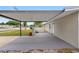 Covered back patio offers a relaxed and private outdoor living space at 5103 Town N Country Blvd, Tampa, FL 33615