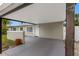 Carport showing close access to front door at 5103 Town N Country Blvd, Tampa, FL 33615