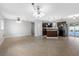 Spacious open living area connecting to the kitchen with tile flooring at 5103 Town N Country Blvd, Tampa, FL 33615