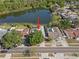 Charming home on a quiet street featuring a screened-in pool and a beautiful private lake at 8024 Timberlane Dr, Tampa, FL 33615