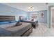 Bedroom with two queen beds, light blue walls, and bright natural light at 8024 Timberlane Dr, Tampa, FL 33615