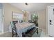 Cozy dining area filled with natural light, perfect for Gathering meals and gatherings at 8024 Timberlane Dr, Tampa, FL 33615