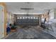 Spacious two-car garage with an automatic door, perfect for storage or vehicles at 8024 Timberlane Dr, Tampa, FL 33615