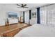 Bright, spacious bedroom with a ceiling fan, two dressers, and lots of natural light at 1101 39Th Ne Ave, St Petersburg, FL 33703