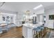 Spacious white kitchen with island, modern appliances, and stylish lighting at 1101 39Th Ne Ave, St Petersburg, FL 33703