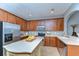 Bright and spacious kitchen with stainless steel appliances, custom cabinets, and a center island at 12646 Carlby Cir, Tampa, FL 33626