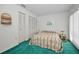 Comfortable bedroom with two closets and bright natural light from the window at 1333 Shady Pine Way # F, Tarpon Springs, FL 34688