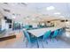Well-lit meeting room with comfortable seating, modern amenities, and a welcoming atmosphere for gatherings and events at 1333 Shady Pine Way # F, Tarpon Springs, FL 34688