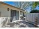 Shaded patio with sliding glass door access for indoor-outdoor living at 1333 Shady Pine Way # F, Tarpon Springs, FL 34688