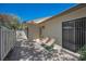 Cozy patio area with chairs, perfect for enjoying the outdoor space at 1333 Shady Pine Way # F, Tarpon Springs, FL 34688