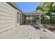 Spacious backyard with a covered wooden deck at 1401 E North St, Tampa, FL 33604
