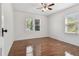 Bedroom with wood floors and natural lighting from windows at 1401 E North St, Tampa, FL 33604