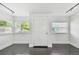 Bright entryway with modern track lighting and tiled floors at 1401 E North St, Tampa, FL 33604