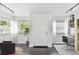 Bright entryway with a white door and tile floors, offering a welcoming first impression at 1401 E North St, Tampa, FL 33604