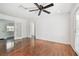 Spacious living room with hardwood floors and french doors bringing in lots of light at 1401 E North St, Tampa, FL 33604