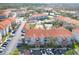 Extensive aerial view of the condo complex including tennis courts and ample parking at 18001 Richmond Place Dr # 1032, Tampa, FL 33647