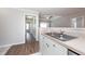 Kitchen with sink and an open view of the dining area at 18001 Richmond Place Dr # 1032, Tampa, FL 33647
