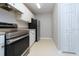 Charming kitchen featuring stainless steel appliances and white cabinetry at 18001 Richmond Place Dr # 1032, Tampa, FL 33647