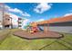 Community playground for with colorful play structure at 18001 Richmond Place Dr # 1032, Tampa, FL 33647