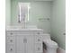 Stylish bathroom with white vanity, modern fixtures, and walk-in glass shower at 2410 Harbourside Dr # 142, Longboat Key, FL 34228