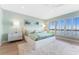 Serene bedroom with natural light, soft colors, and comfortable furnishings for restful sleep at 2410 Harbourside Dr # 142, Longboat Key, FL 34228