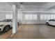 Clean parking garage featuring reserved parking spots at 2410 Harbourside Dr # 142, Longboat Key, FL 34228