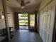 Bright sunroom boasts tile flooring, large windows with a view, and closet storage at 2465 Northside Dr # 604, Clearwater, FL 33761