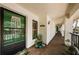 Inviting front entrance featuring a decorated door and charming seaside-themed accents and decor at 2537 Royal Pines Cir # 19I, Clearwater, FL 33763