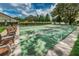 Outdoor shuffleboard courts surrounded by benches offer a recreational amenity at 2537 Royal Pines Cir # 19I, Clearwater, FL 33763