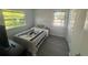 Simple bedroom with natural light and a cozy atmosphere for restful nights at 300 S Highland Ave, Tarpon Springs, FL 34689