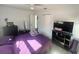 Bright bedroom featuring a double bed, modern furnishings, and ample natural light at 300 S Highland Ave, Tarpon Springs, FL 34689