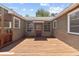 Wooden deck with adjacent house featuring awning-covered door at 3124 9Th N Ave, St Petersburg, FL 33713
