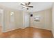 Neutral bedroom featuring wood laminate flooring, a closet, and a window for natural light at 3124 9Th N Ave, St Petersburg, FL 33713