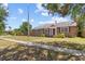 Charming single-story home with a well-maintained lawn and a brick chimney at 3124 9Th N Ave, St Petersburg, FL 33713