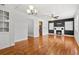 Spacious living room featuring hardwood floors, a fireplace, and a doorway to another room at 3124 9Th N Ave, St Petersburg, FL 33713