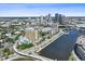 Stunning aerial view of the condo building, city skyline, river, and surrounding roadways at 345 Bayshore Blvd # 1502, Tampa, FL 33606