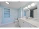 Bright and airy bathroom featuring a vanity with a white countertop and tiled floors at 345 Bayshore Blvd # 1502, Tampa, FL 33606