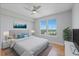 Well-lit bedroom with a large window offering city views at 345 Bayshore Blvd # 1502, Tampa, FL 33606