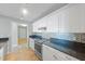 Well-lit kitchen with stainless steel appliances, granite countertops, and modern backsplash at 345 Bayshore Blvd # 1502, Tampa, FL 33606
