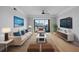Bright living room features stylish decor, balcony access, and a comfortable sitting area at 345 Bayshore Blvd # 1502, Tampa, FL 33606