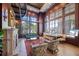 Elegant living room showcasing a fireplace, spiral staircase, and beautiful windows providing natural light at 345 Bayshore Blvd # 1502, Tampa, FL 33606