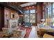 Elegant living room featuring a spiral staircase, large windows, fireplace, and herringbone floors at 345 Bayshore Blvd # 1502, Tampa, FL 33606